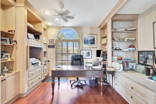 office featuring ceiling fan, hardwood / wood-style floors, built in features, and a textured ceiling