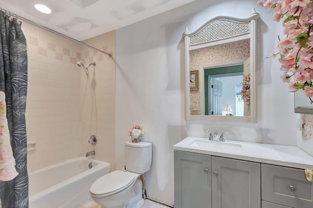 full bathroom featuring vanity, toilet, and shower / bath combo with shower curtain