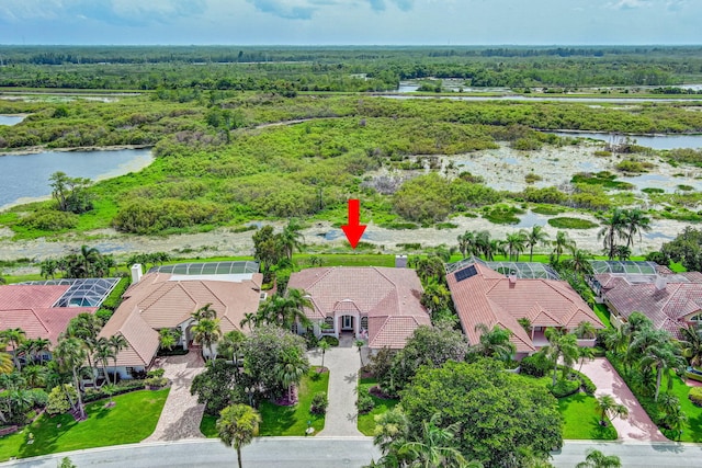 birds eye view of property featuring a water view