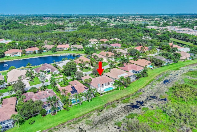 bird's eye view with a water view