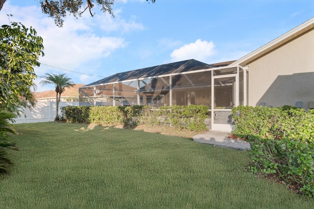 view of yard with a lanai