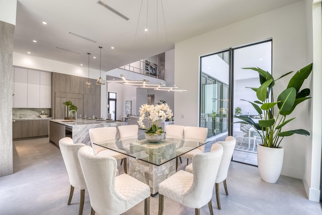 dining space featuring sink