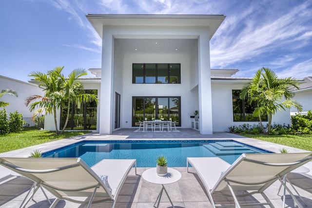 rear view of house with a patio