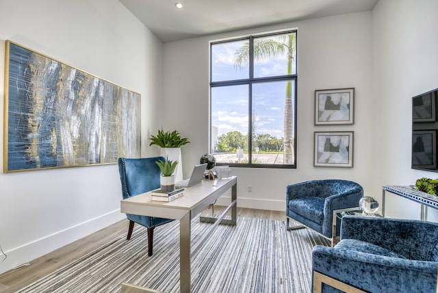 home office with hardwood / wood-style floors and plenty of natural light