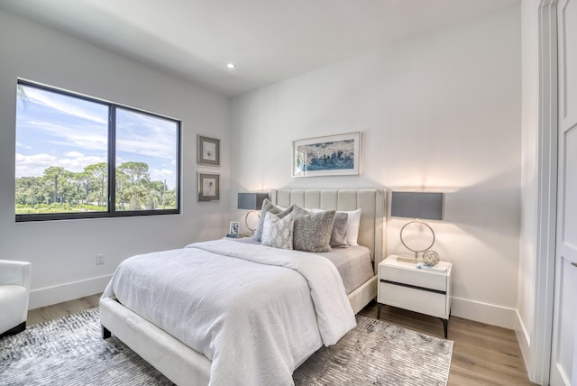 bedroom featuring light hardwood / wood-style floors