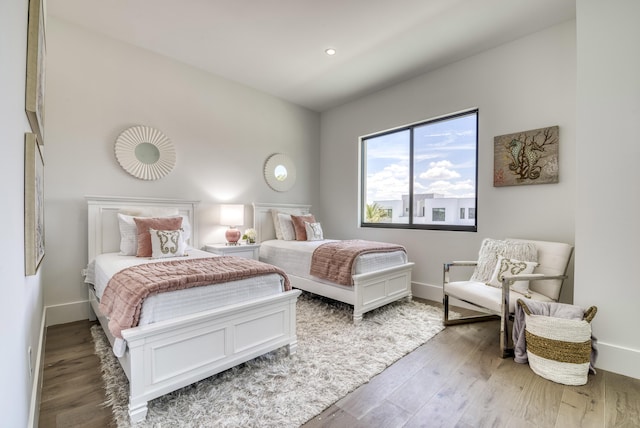 bedroom featuring hardwood / wood-style floors