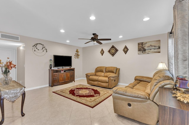 tiled living room with ceiling fan