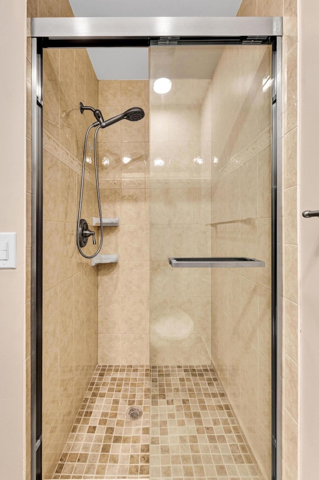 bathroom with an enclosed shower