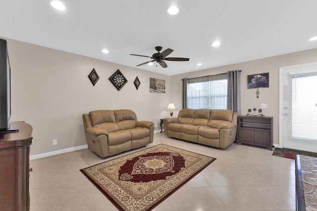 tiled living room featuring ceiling fan