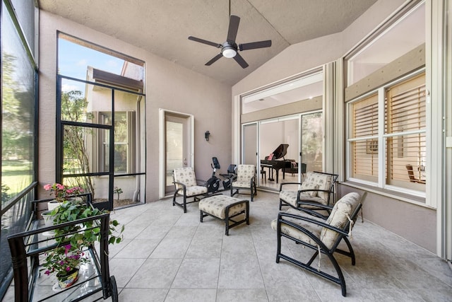sunroom with vaulted ceiling and ceiling fan