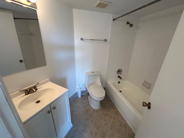 full bathroom with tile patterned floors, vanity, toilet, and tiled shower / bath