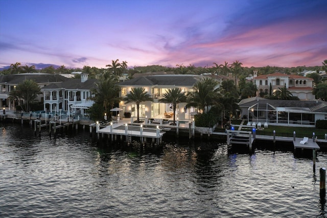 view of dock with a water view and boat lift