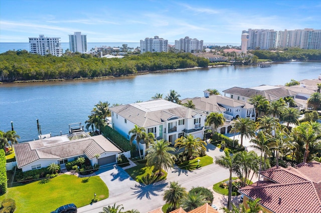 aerial view featuring a water view and a city view