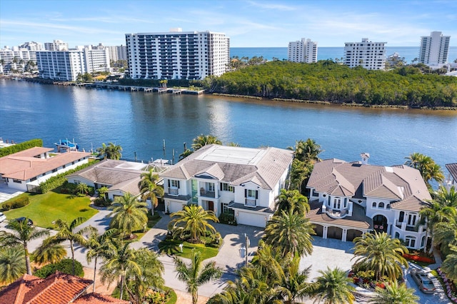 bird's eye view featuring a water view and a view of city