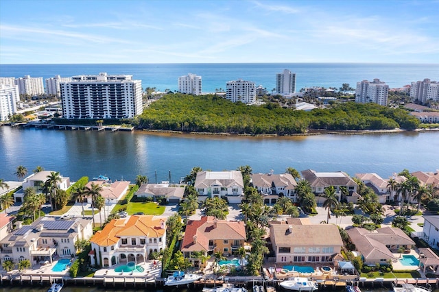 aerial view with a water view and a residential view