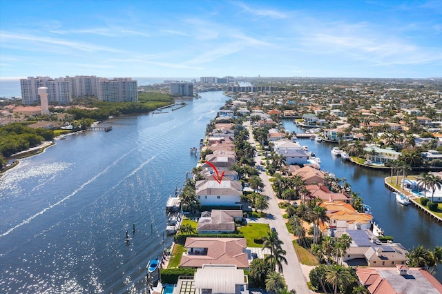 bird's eye view featuring a city view, a residential view, and a water view