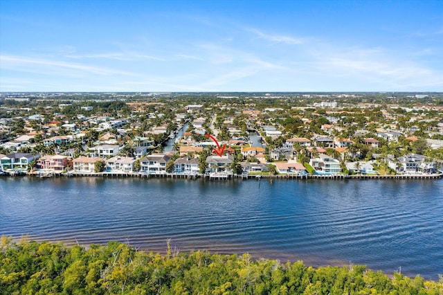 bird's eye view featuring a residential view and a water view