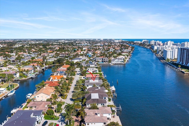 bird's eye view featuring a residential view and a water view