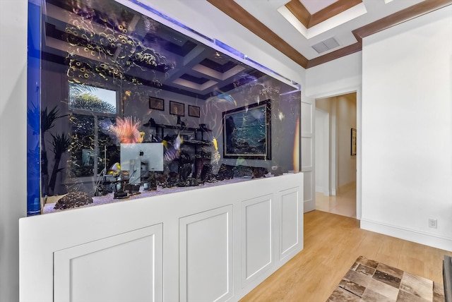 bar with beamed ceiling, coffered ceiling, visible vents, and light wood finished floors