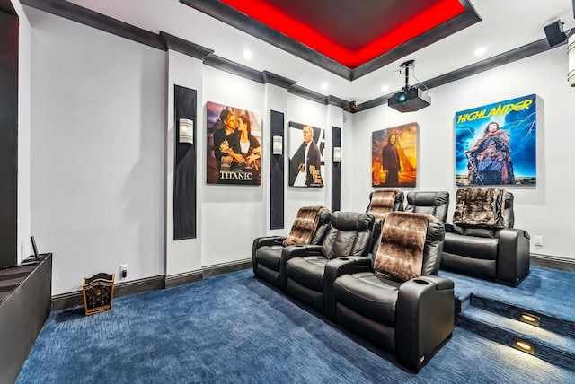 home theater featuring baseboards, recessed lighting, carpet flooring, and a tray ceiling