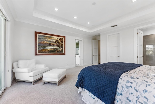 bedroom with light colored carpet, baseboards, recessed lighting, and a tray ceiling