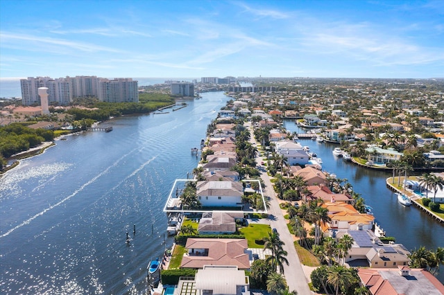 bird's eye view featuring a water view, a residential view, and a city view