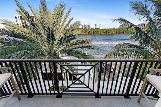 balcony featuring a water view