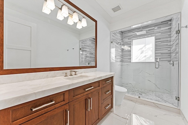 bathroom with marble finish floor, toilet, visible vents, a marble finish shower, and vanity