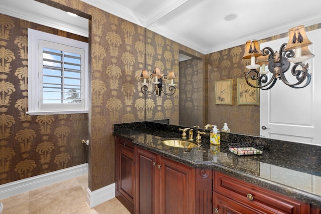 bathroom with tile patterned floors, vanity, baseboards, and wallpapered walls