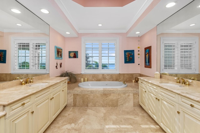 full bath featuring a sink and crown molding