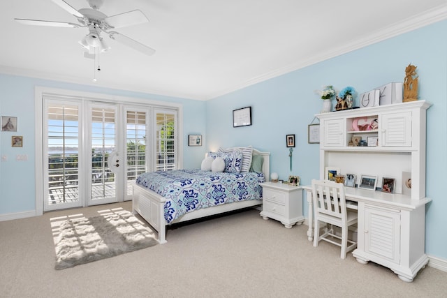 bedroom with light colored carpet, baseboards, access to exterior, french doors, and ornamental molding