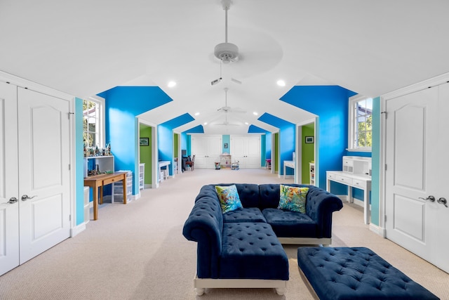 carpeted living area featuring lofted ceiling, ceiling fan, visible vents, and recessed lighting