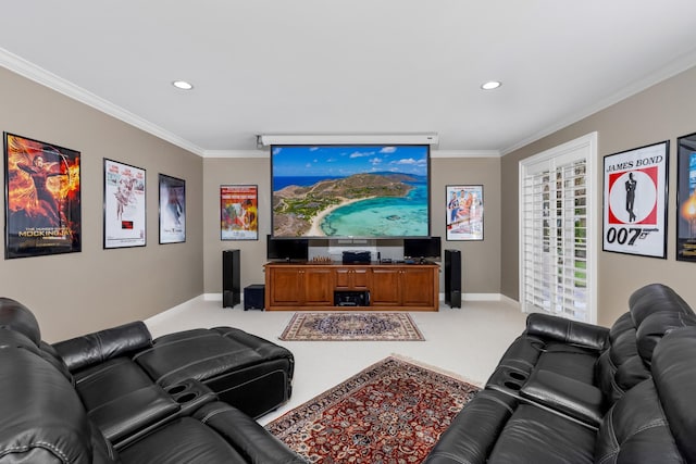 home theater room featuring ornamental molding, recessed lighting, light colored carpet, and baseboards