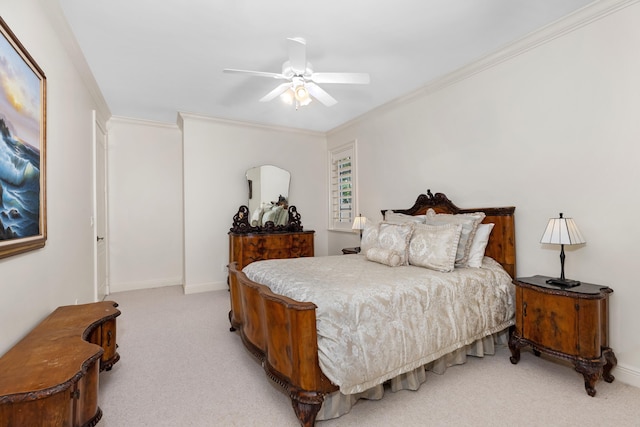 bedroom with light carpet, ornamental molding, a ceiling fan, and baseboards