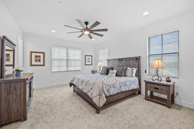 carpeted bedroom featuring ceiling fan