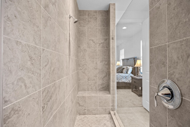 bathroom featuring a tile shower