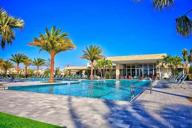 view of swimming pool with a patio