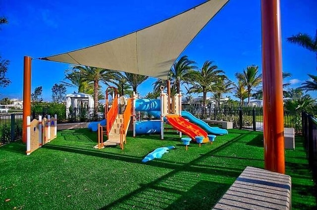 view of play area featuring a lawn