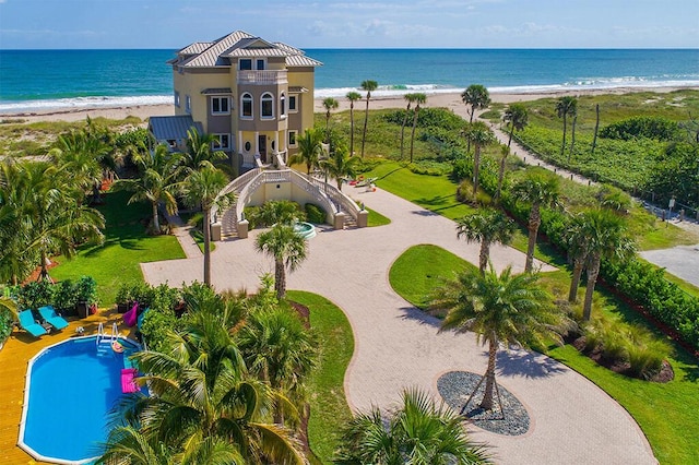 bird's eye view with a water view and a view of the beach