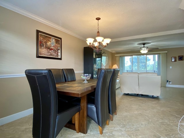 dining area featuring crown molding, ceiling fan with notable chandelier, and a textured ceiling