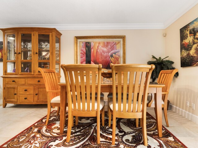 tiled dining area with ornamental molding