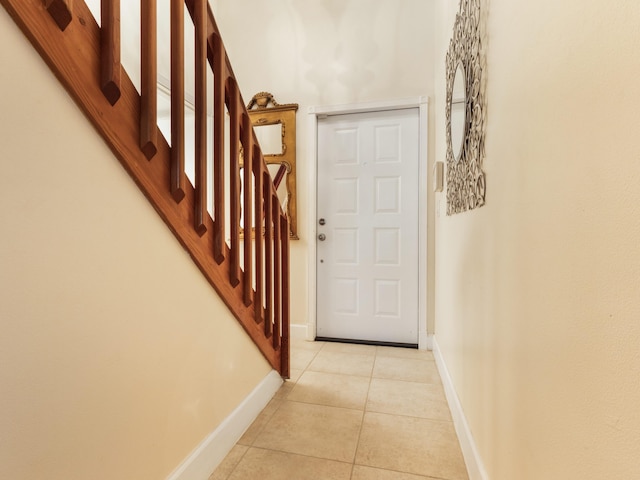 interior space with light tile patterned floors