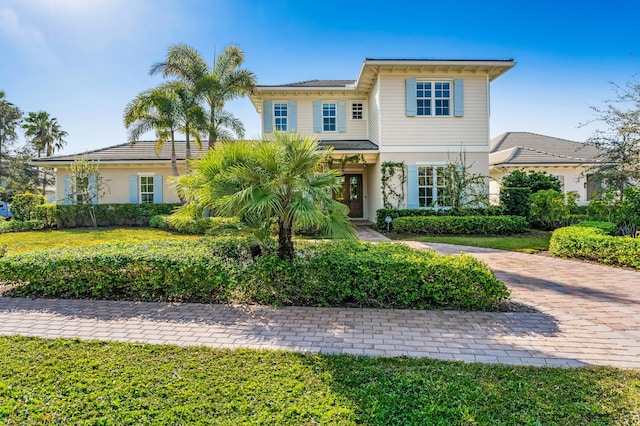 view of front of house with a front lawn