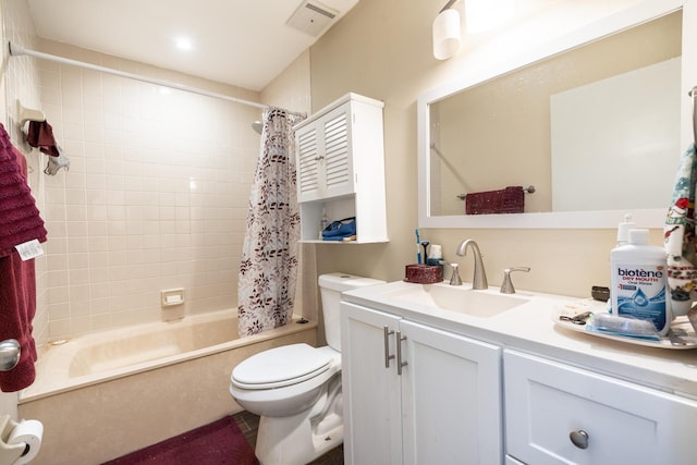 bathroom featuring toilet, visible vents, shower / tub combo with curtain, and vanity