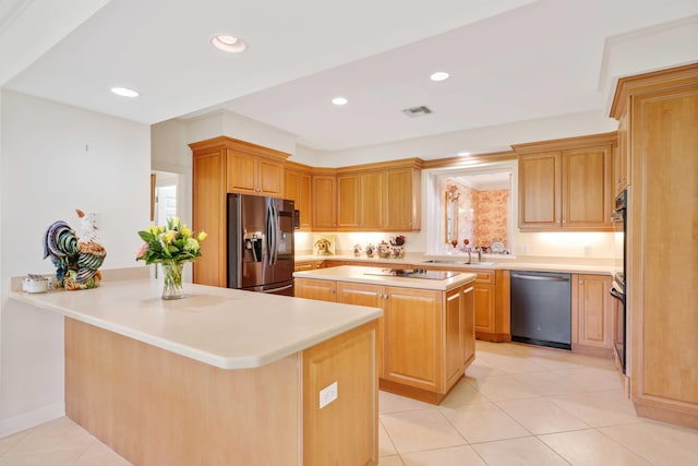 9 Par Club Cir, Village Of Golf, FL 33436 - kitchen featuring light tile patterned floors, black appliances, a kitchen island, sink, and kitchen peninsula