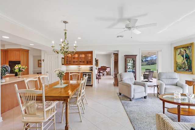 9 Par Club Cir, Village Of Golf, FL 33436 - tiled dining room featuring ceiling fan with notable chandelier and ornamental molding