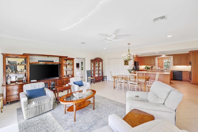 9 Par Club Cir, Village Of Golf, FL 33436 - tiled living room featuring ceiling fan with notable chandelier