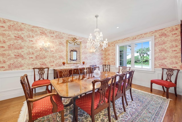 9 Par Club Cir, Village Of Golf, FL 33436 - dining space featuring ornamental molding, an inviting chandelier, and wood-type flooring