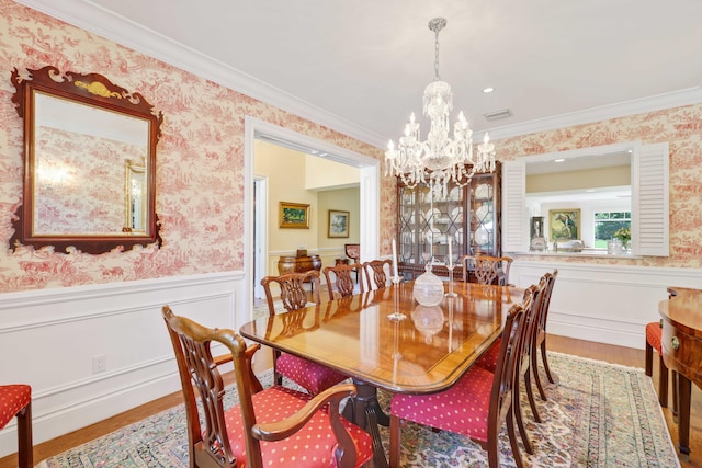 9 Par Club Cir, Village Of Golf, FL 33436 - dining room with ornamental molding, a chandelier, and light hardwood / wood-style floors