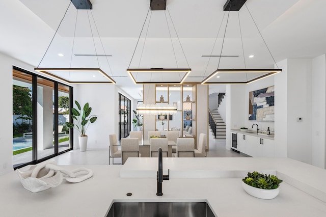 kitchen featuring pendant lighting and sink